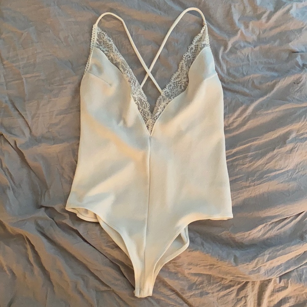 Laced V neck white body suit